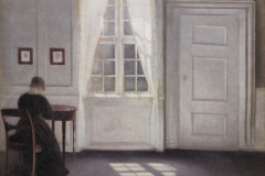 Vilhelm Hammershøi, Interior on the Strandgued with the Artists Wife at the table and the Sun on the floor, 1901.